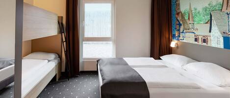 A hotel room with two single beds, a sofa bed, a window with curtains, a painting on the wall, and a small table.
