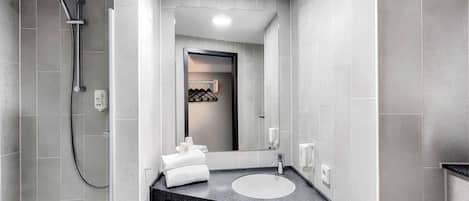 Shower, hair dryer, towels