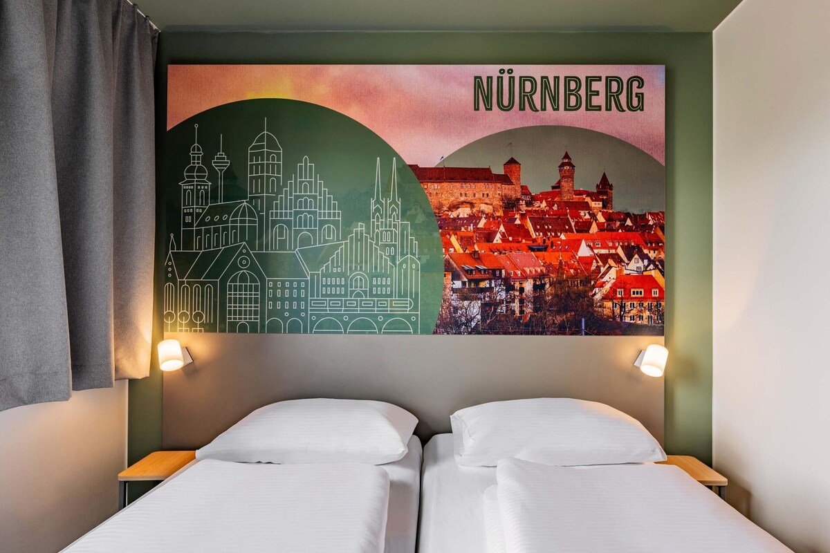 Twin kamer | Een bureau, geluiddichte muren, gratis wifi, beddengoed