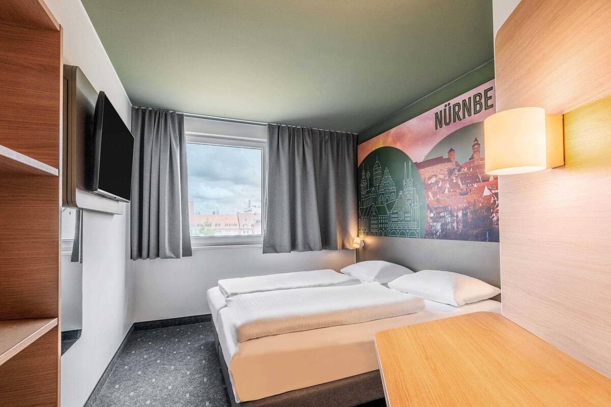 Habitación con 2 camas individuales | Escritorio, sistema de insonorización, wifi gratis y ropa de cama