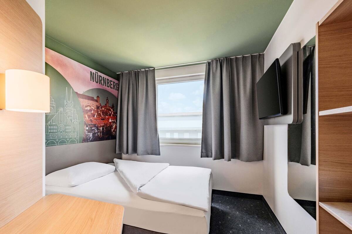 Habitación individual | Escritorio, sistema de insonorización, wifi gratis y ropa de cama