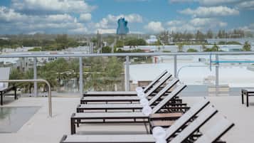 Outdoor pool, free pool cabanas, pool umbrellas