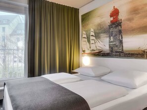 ダブルルーム | 低刺激性寝具、デスク、防音設備、WiFi (無料)