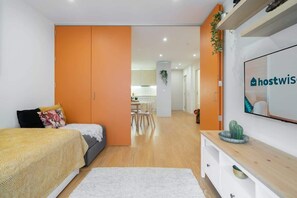 2 bedrooms, iron/ironing board, travel cot, WiFi - Colorful Bright Flat w/ Balcony by HostWise (Porto)