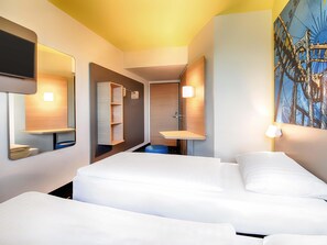 Ropa de cama hipoalergénica, escritorio y sistema de insonorización