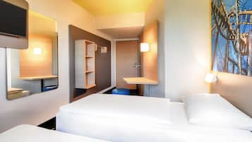 Ropa de cama hipoalergénica, escritorio y sistema de insonorización