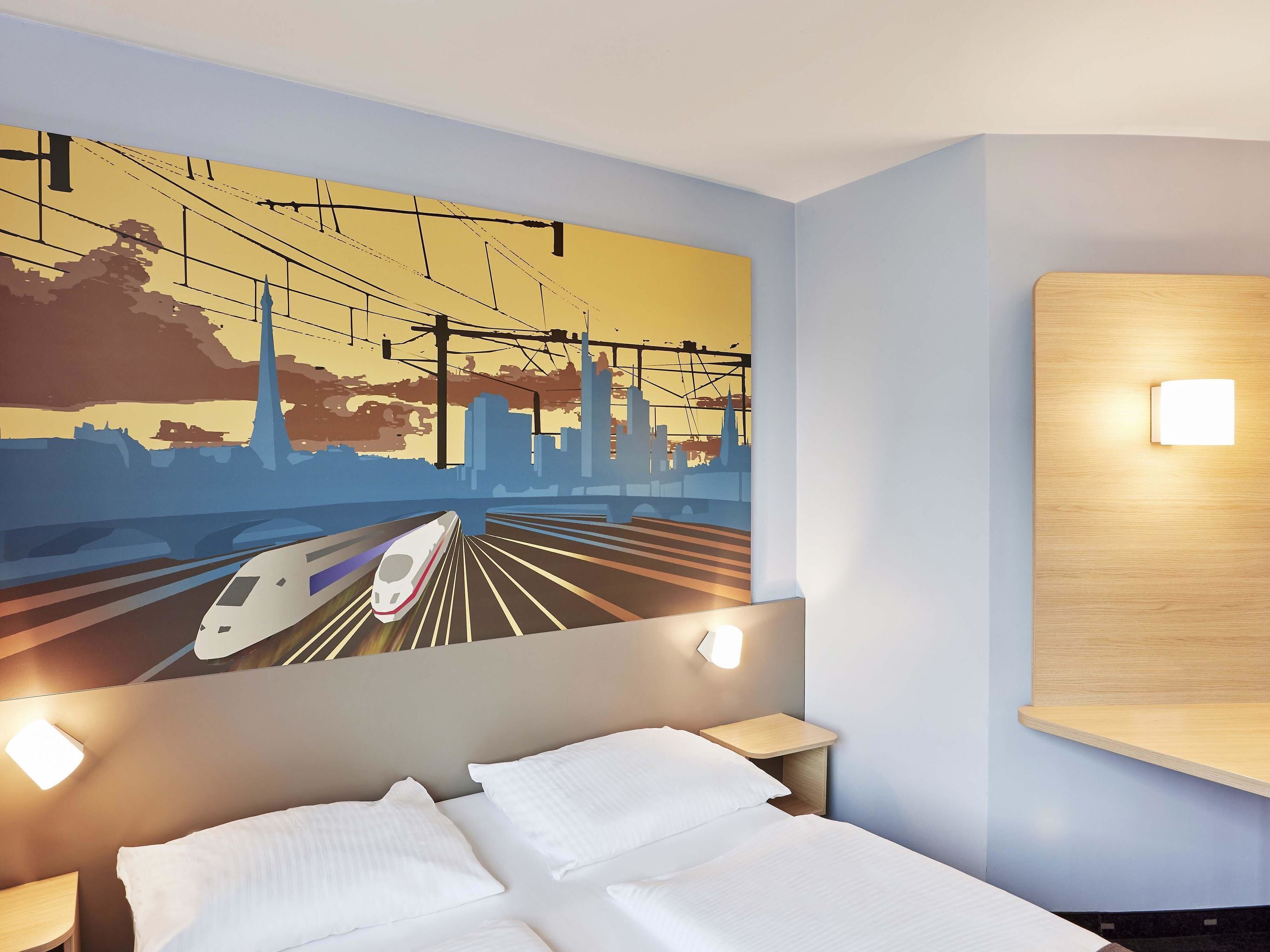 Ropa de cama hipoalergénica, escritorio y sistema de insonorización 