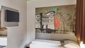 Escritorio, sistema de insonorización, wifi gratis y ropa de cama