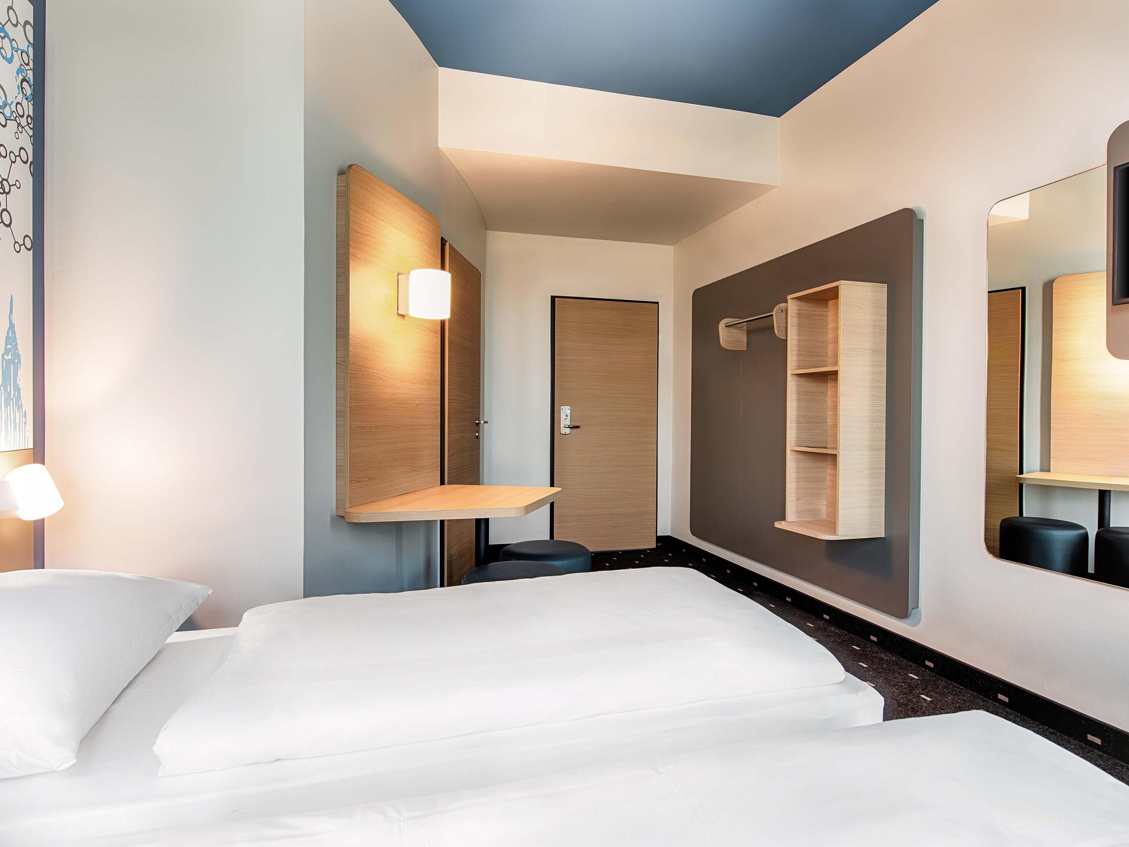 Twin kamer | Een bureau, geluiddichte muren, gratis wifi, beddengoed