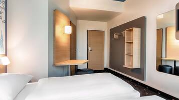 Twin kamer | Een bureau, geluiddichte muren, gratis wifi, beddengoed