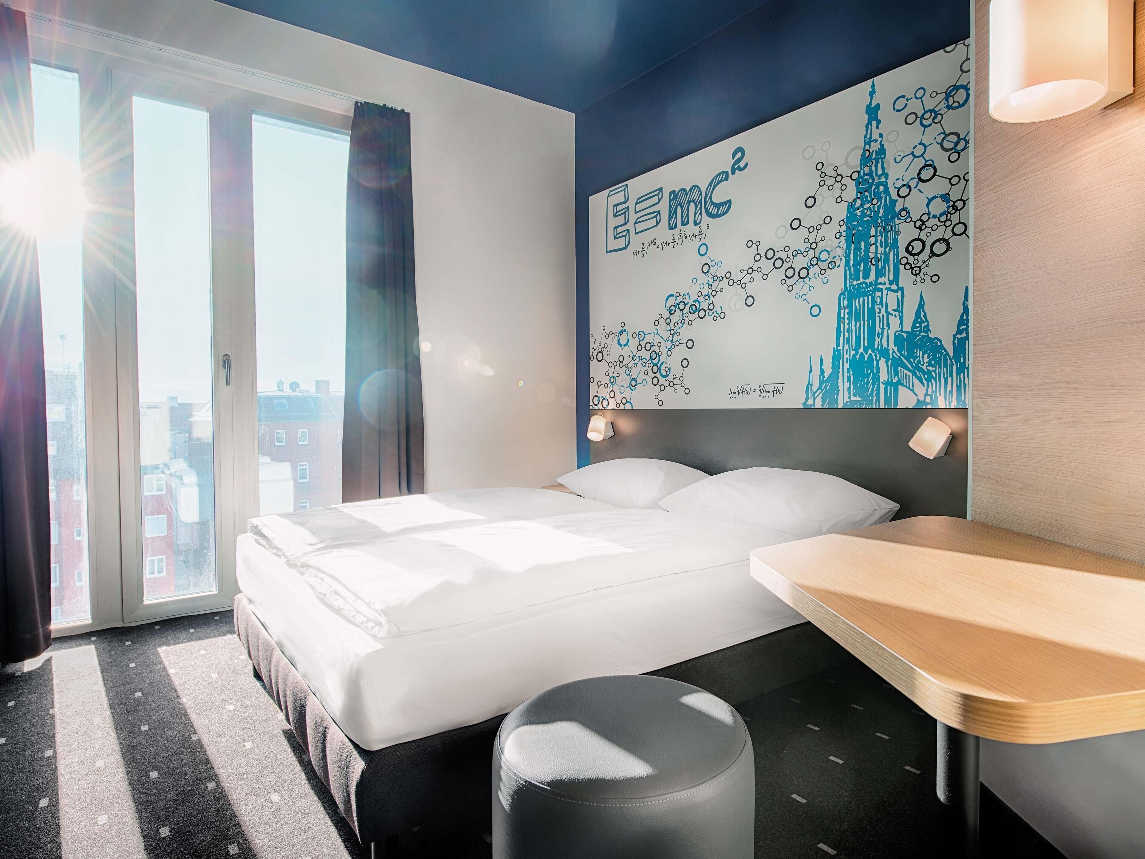 Tweepersoonskamer | Een bureau, geluiddichte muren, gratis wifi, beddengoed