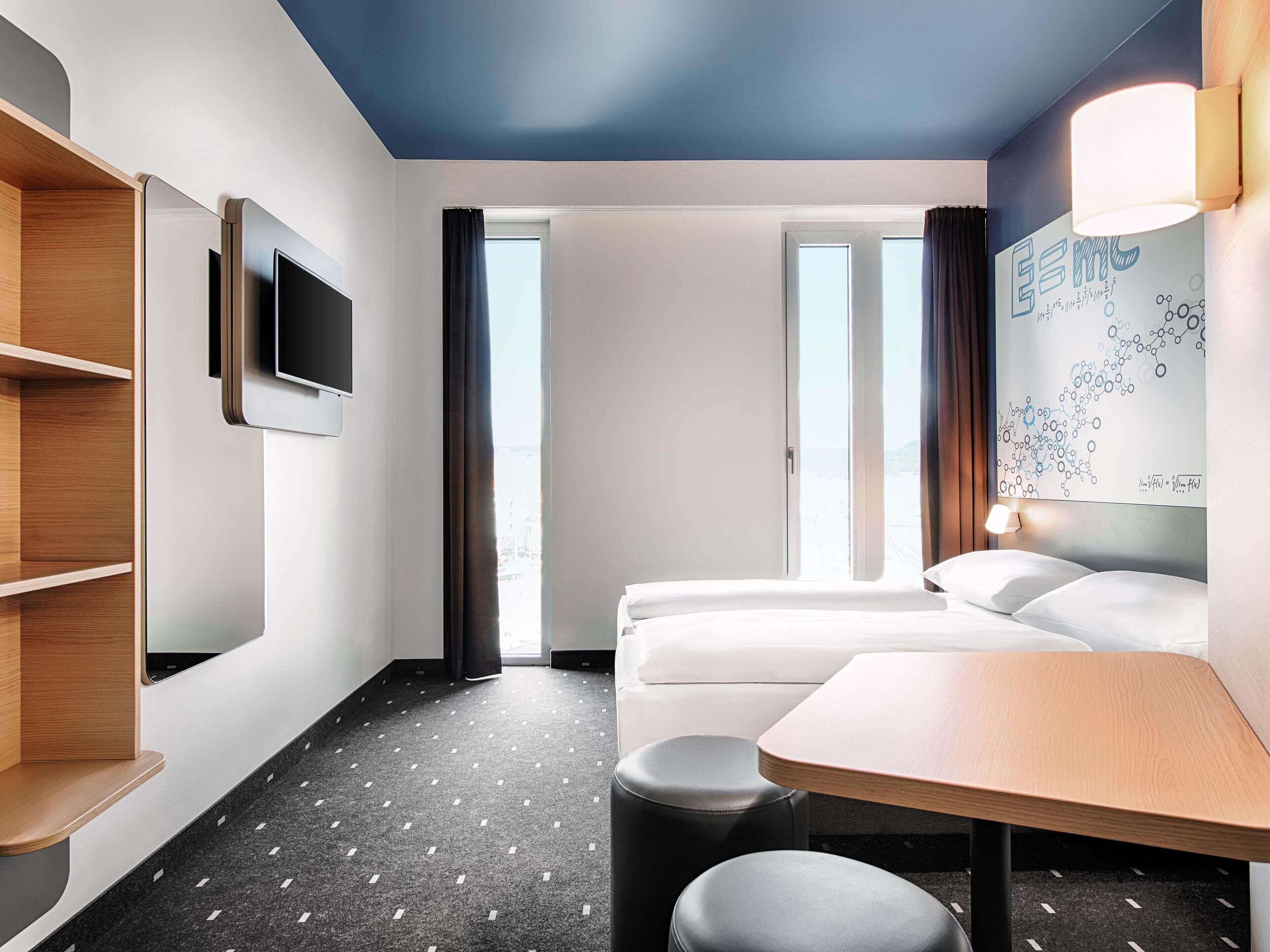 Twin kamer | Een bureau, geluiddichte muren, gratis wifi, beddengoed