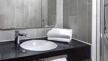 Shower, hair dryer, soap, shampoo