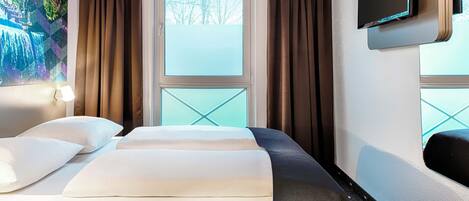 Ropa de cama hipoalergénica, escritorio, insonorización y wifi gratis