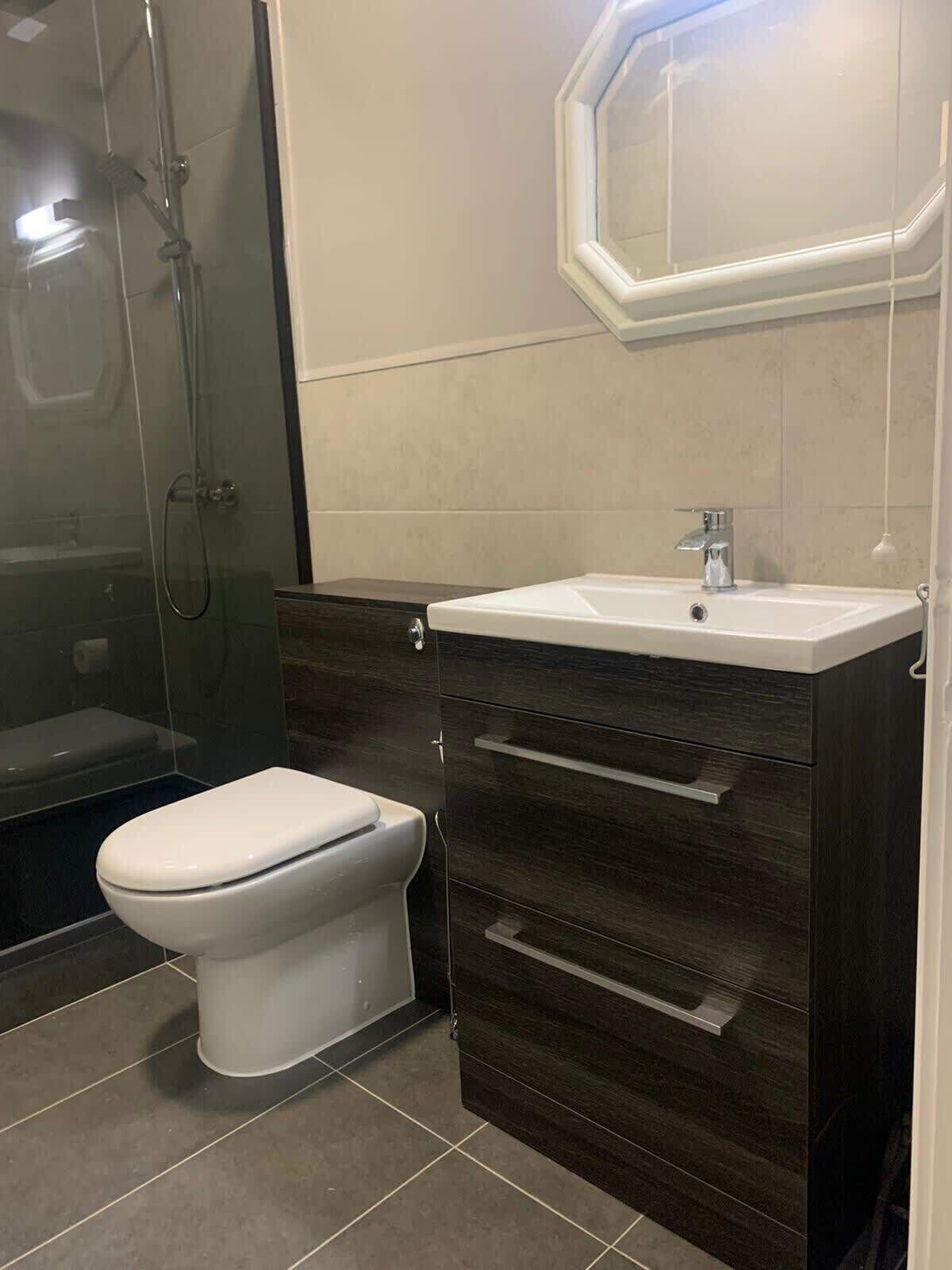Shower, hair dryer, towels, shampoo