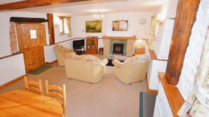 Cottage | Living area | LCD TV - The Stables (Ryde)