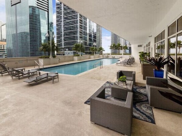 Outdoor pool, a heated pool - Luxury Brickell Studio (Miami)