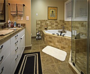 Combined shower/tub, hair dryer, towels, soap