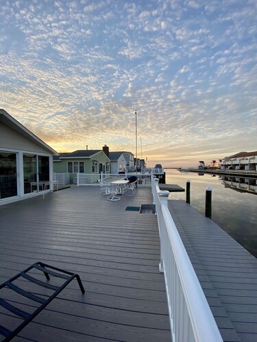 Waterfront Escape with Private Dock, Sunset Views, and Beach Badges!