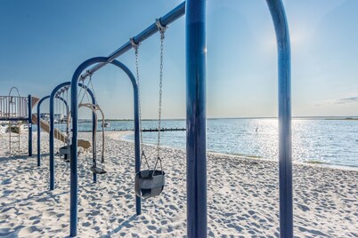 Waterfront Escape with Private Dock, Sunset Views, and Beach Badges!