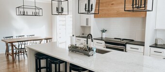 Bright stylish home minutes to downtown! New build with HUGE pool/hot tub combo!