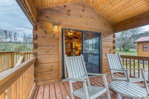 Terrace/patio - Four cozy cabins w/ private hot tubs & shared pool + free attraction tickets (Sevierville)