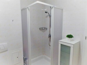 Regadera y secadora de cabello 