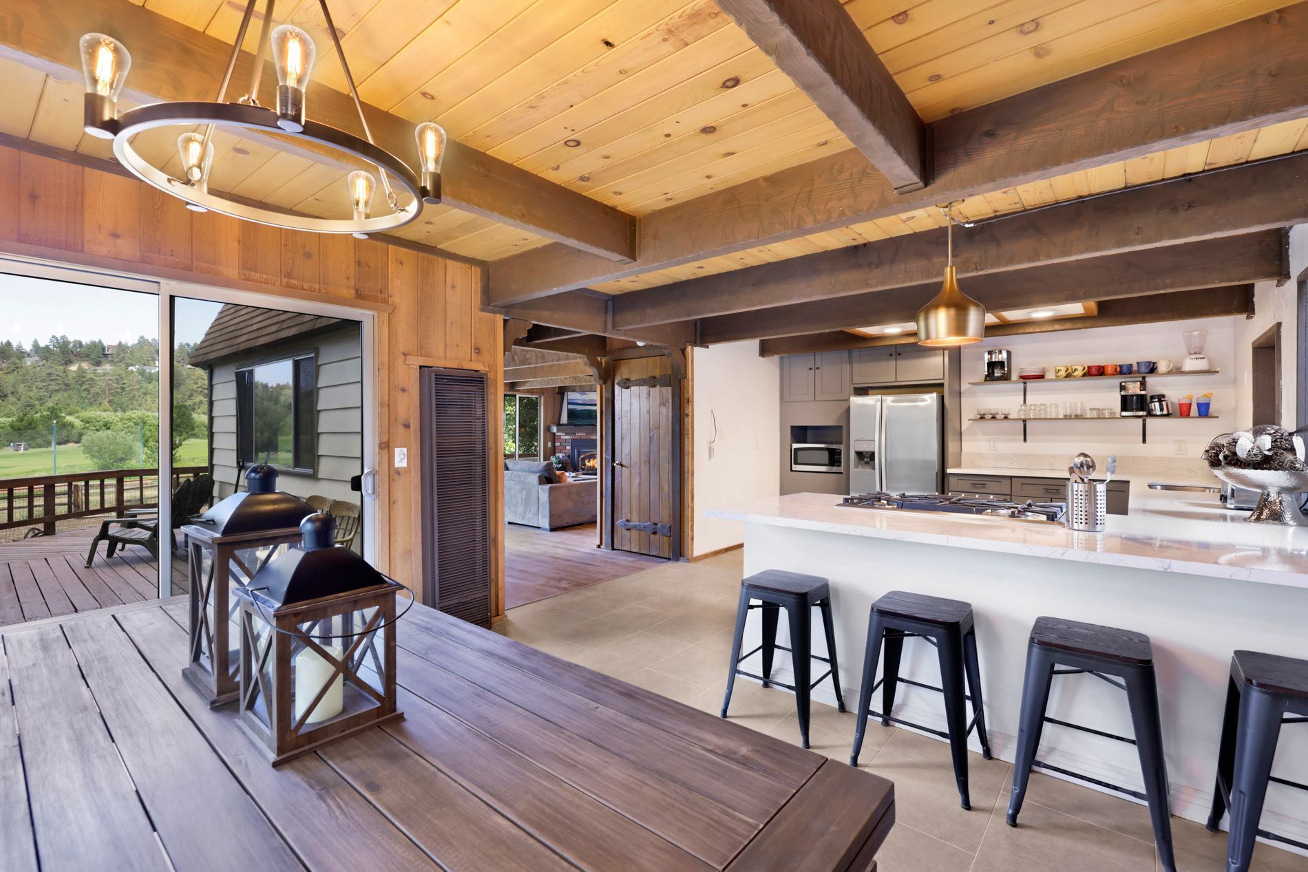 Fully equipped cabin kitchen with ample cabinetry, stove, fridge, microwave, and coffee maker—perfect for cooking meals, morning coffee, and feeling right at home on your stay.