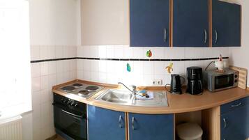 Fridge, oven, high chair