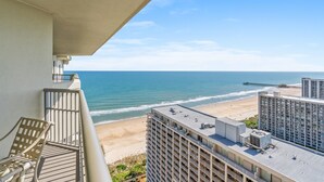 A balcony with a view of the beach and ocean. - Royale Palms 2406G Studio Penthouse, Pool (Myrtle Beach)