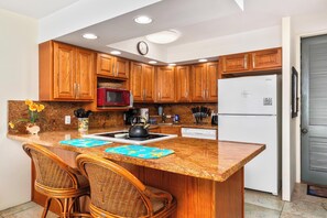 Fridge, microwave, stovetop - 🐳 Newly Renovated Oceanfront Condo in Kona! 🌅 - Hale Kona Kai 302 (Kailua Kona)