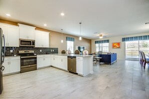 Fridge, microwave, cookware/dishes/utensils