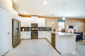 Fridge, microwave, cookware/dishes/utensils