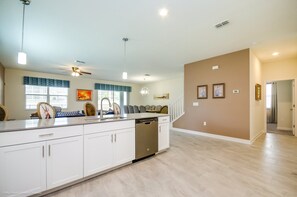 Fridge, microwave, cookware/dishes/utensils