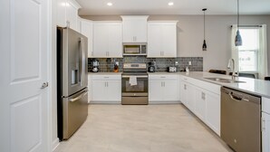 Villa (351 0CEAN Amazing Champions Gate 9 B) | Private kitchen | Fridge, microwave, cookware/dishes/utensils