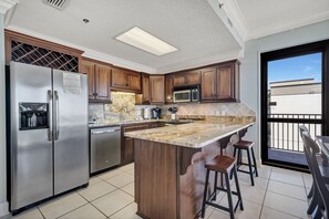 Fridge, microwave, oven, stovetop - Phoenix VI 1515 | Beachfront | Panoramic Top Floor Views! | Covered Parking | My Beach Getaways (Orange Beach)