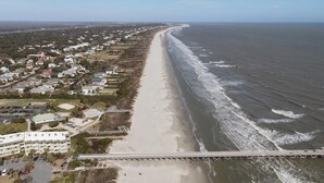 A coastal town with a long beach, a bridge, and residential buildings. - Outstanding Oceanfront Condo with Private Balcony! (Isle of Palms)