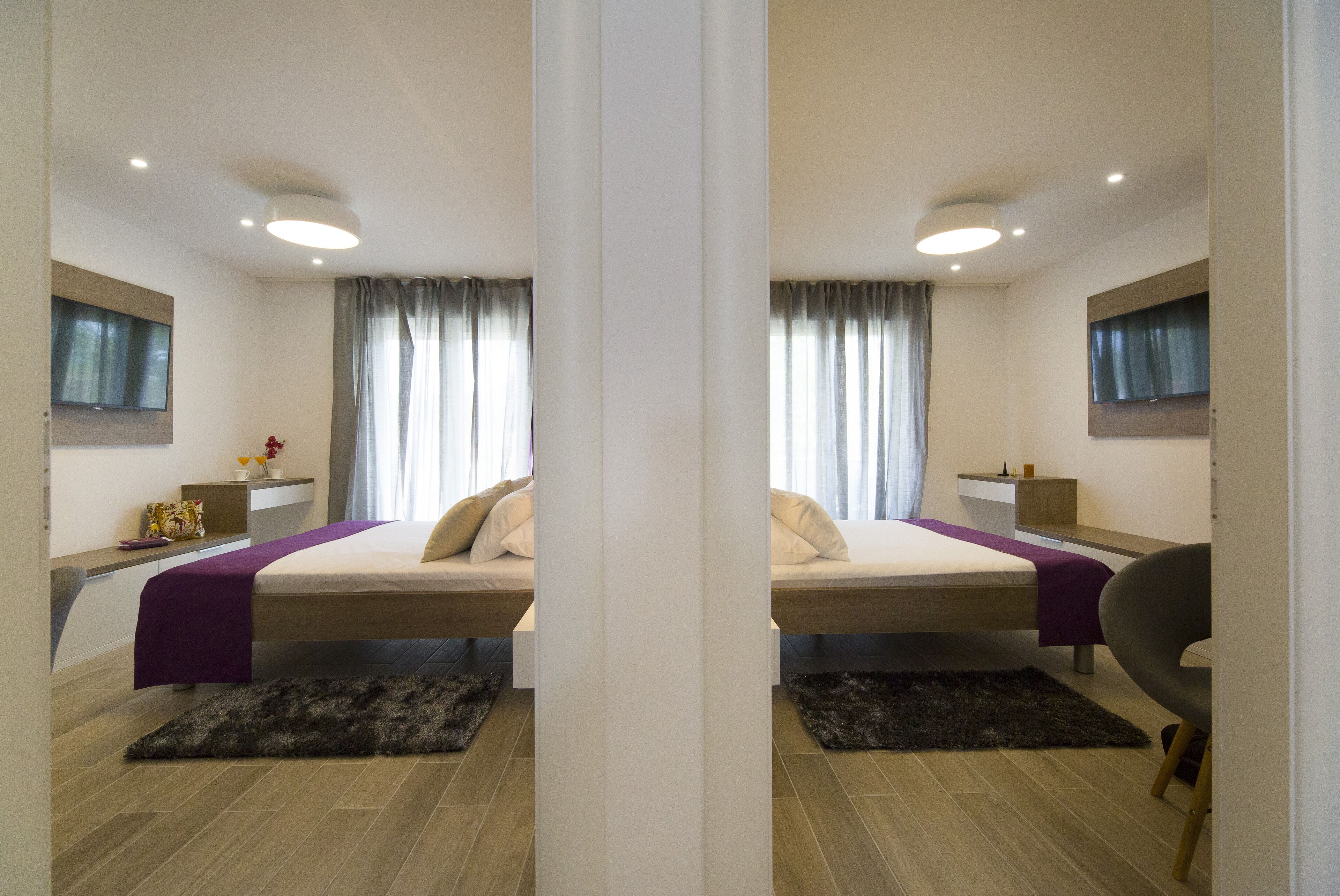 Apartemen Deluks | 2 kamar tidur, brankas, meja kerja, dan ruang kerja ramah laptop