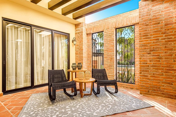 Outdoor patio opens to living room.