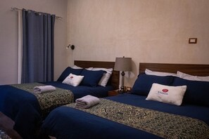 Premium bedding, down duvets, pillow-top beds, individually decorated