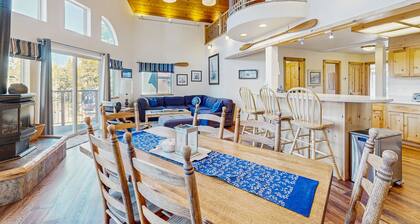 Family-friendly, lakefront getaway w/ a gas fireplace, furnished deck, & views