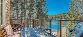 Family-friendly, lakefront getaway w/ a gas fireplace, furnished deck, & views
