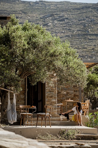 A house in an olive grove with a unique view to the Aegean sea.