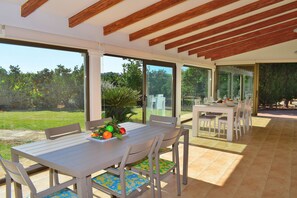 Enjoy al fresco dining in a serene garden setting with a view.
