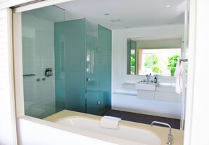 Bathtub, hair dryer, towels, soap