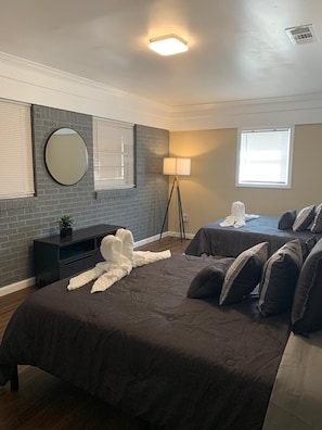 4 bedrooms, premium bedding, memory-foam beds, iron/ironing board