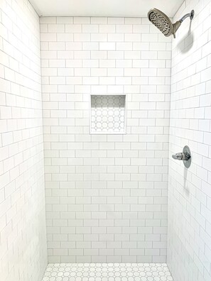 Bathtub, hair dryer, towels, soap