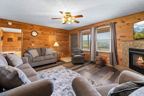 Flat-screen TV, fireplace, DVD player