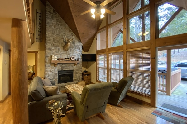 Enjoy the beautiful views from the wall of windows right from the Living Room