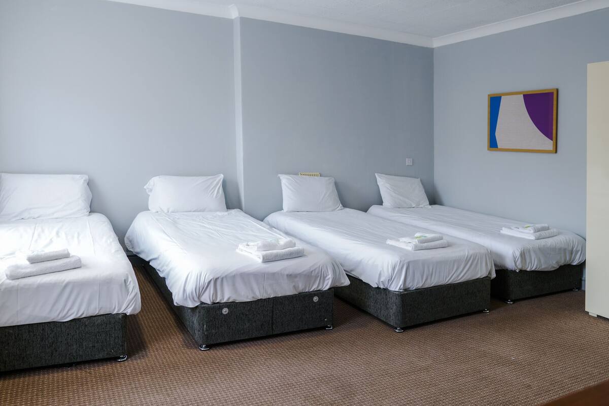 Basic Quadruple Room | WiFi (free), bed sheets